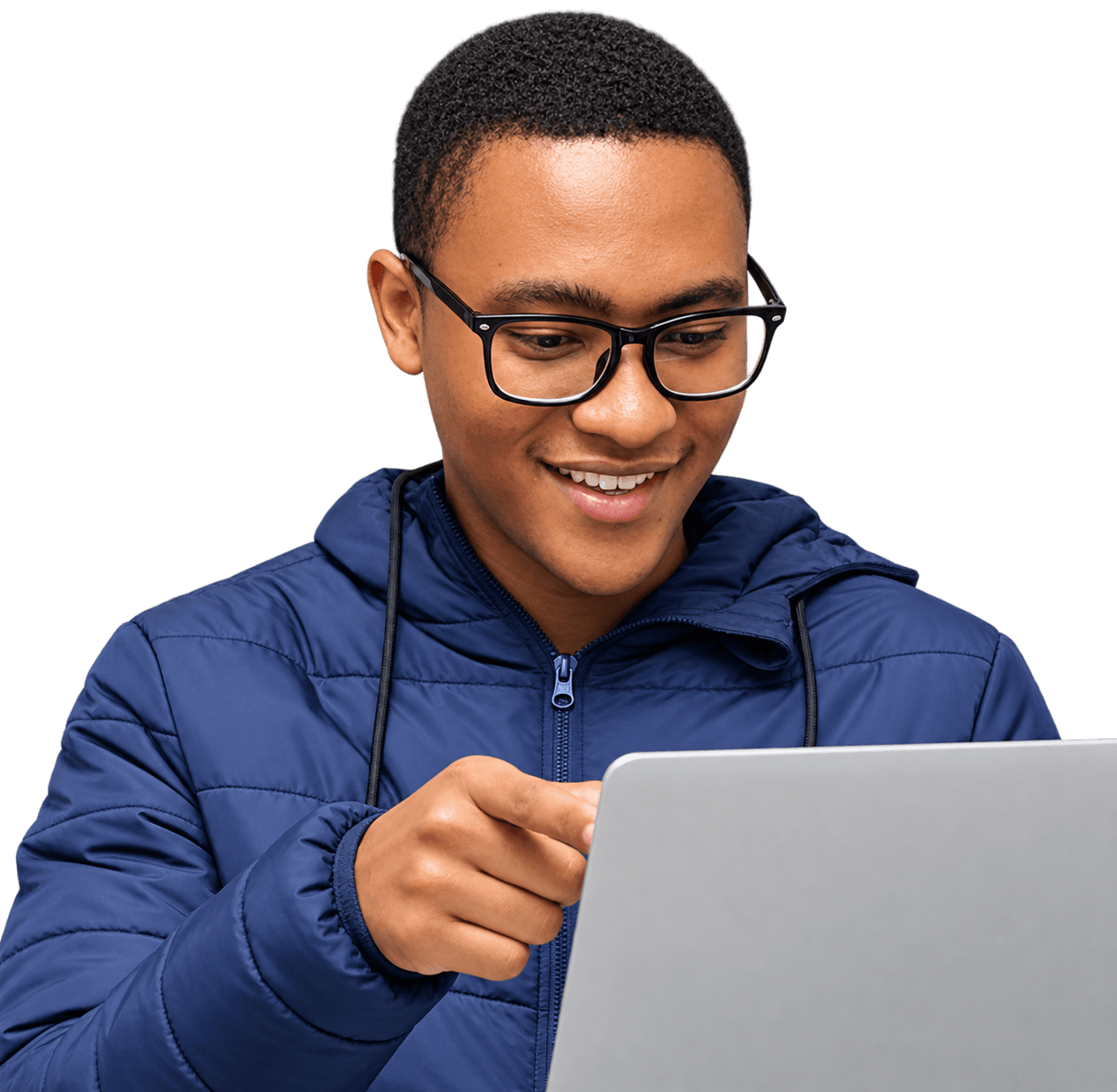 Daniel Romeo smiling while working at a laptop